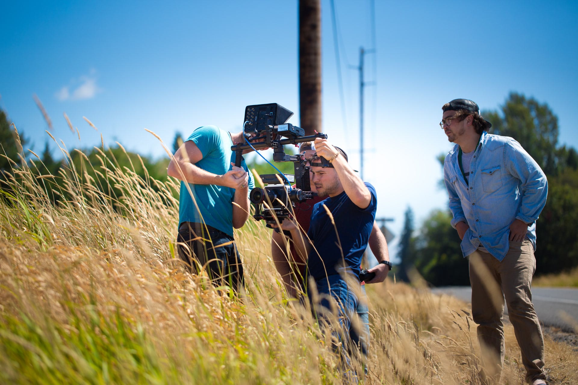 CC crew shooting in tall grass